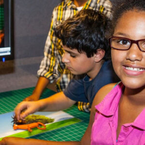 Two children at the Design Quest exhibit