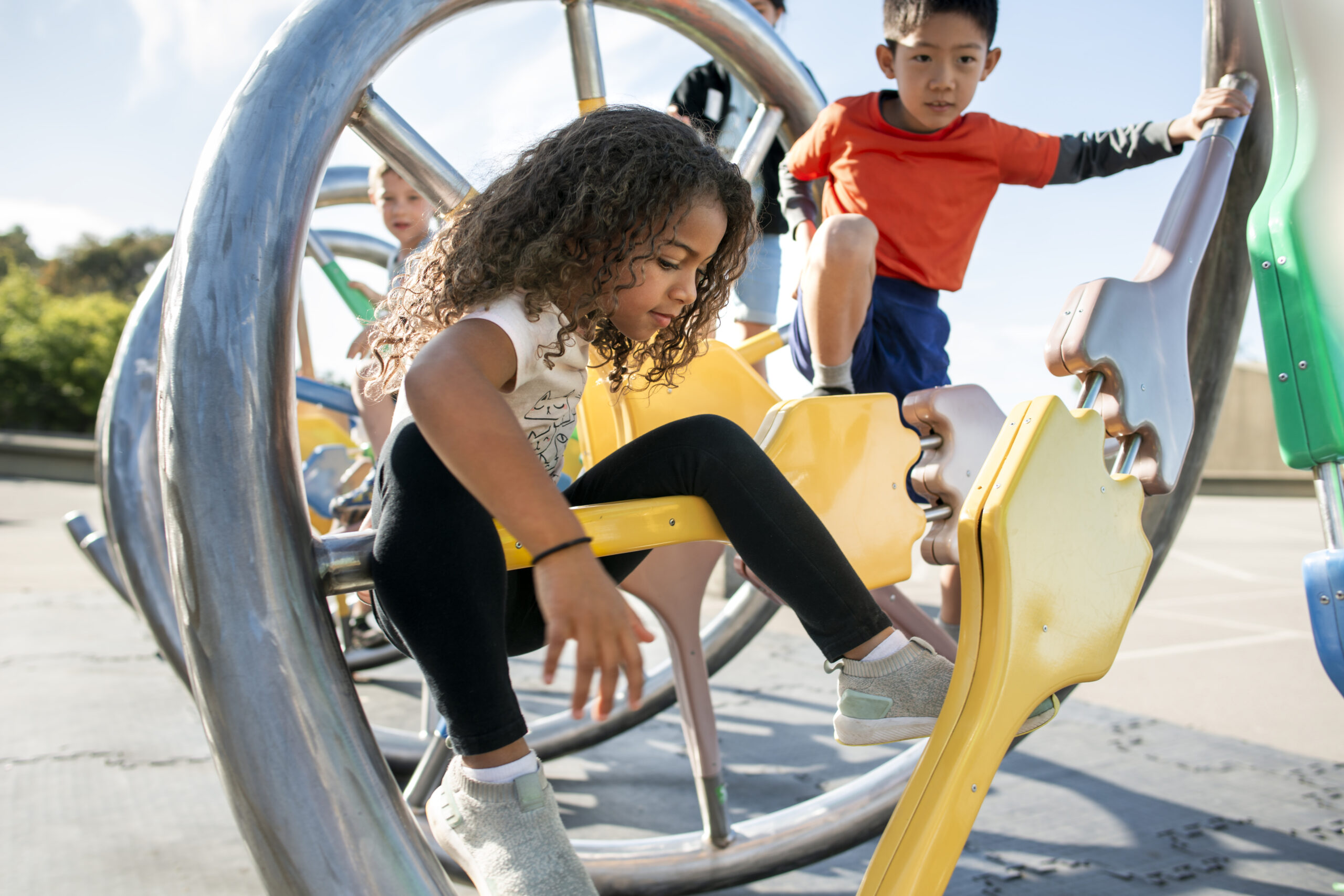 Children climb on the DNA Structure at The Lawrence