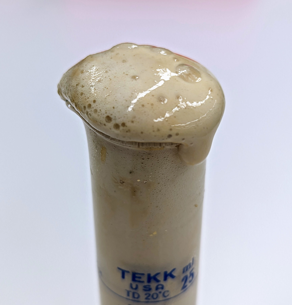 A measuring tube with a yeast sample from a biotech yeast activity