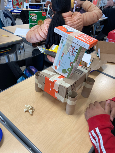 A project is constructed during a Make Math REAL activity.