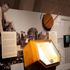 A view of the text panels and display cases in the Ernest O. Lawrence exhibit.