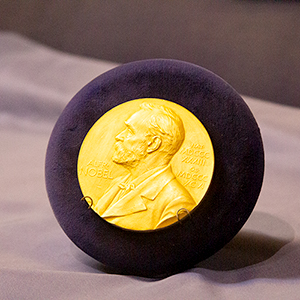 Ernest Lawrence's Nobel Prize, a large gold medallion featuring the face of the prize's namesake Alfred Nobel.