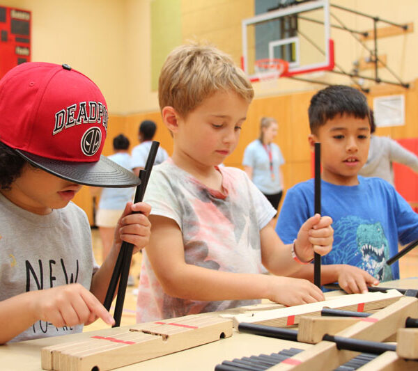 Students participate in a Science Festival activity at their school