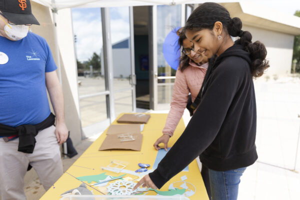 Two people making Sunprints with The Lawrence staff