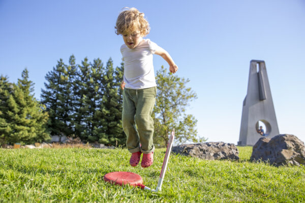 Child playing with rocket launch activity