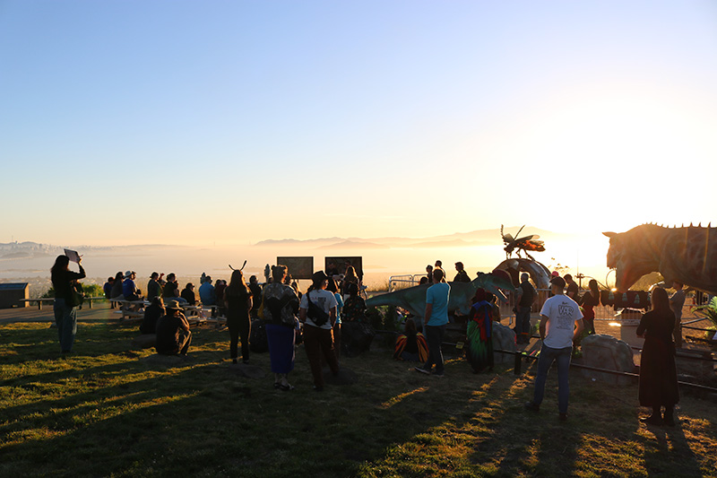 Guests take in the sunset at the Buzz of Science event at The Lawrence