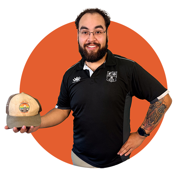 Community Science Hero Saul Cuevas-Landeros, holding a hat